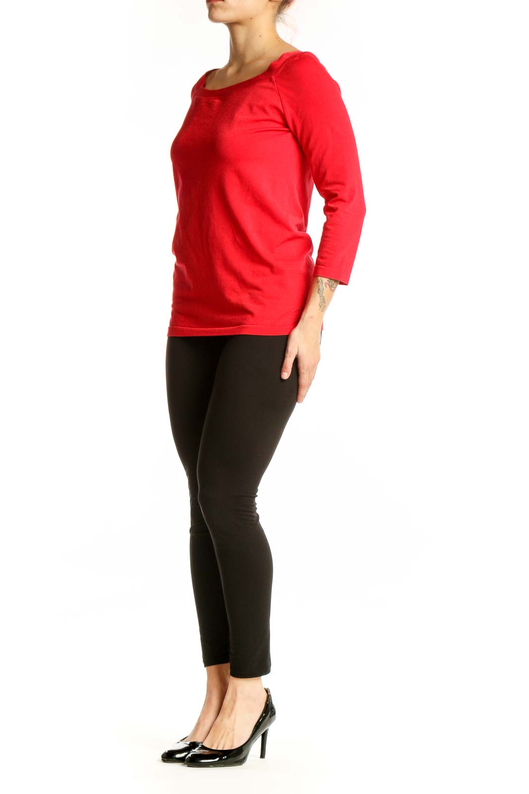 Red long sleeve cotton top with crew neckline, front view on model