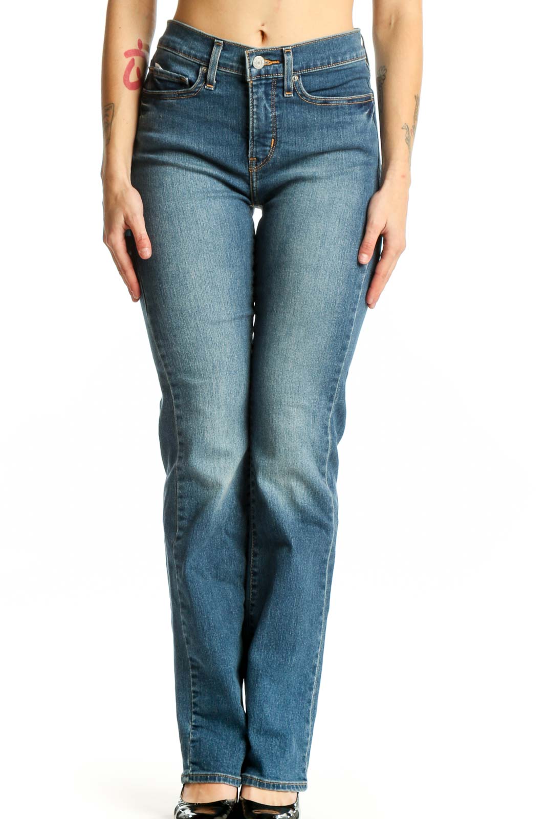 Front view of blue Levi's bootcut jeans on model, size S, showing classic five-pocket design and mid-rise fit