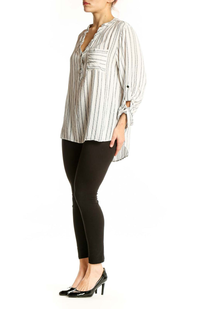 Cream and gray striped rayon button-up blouse with V-neckline and adjustable roll-tab sleeves, front view