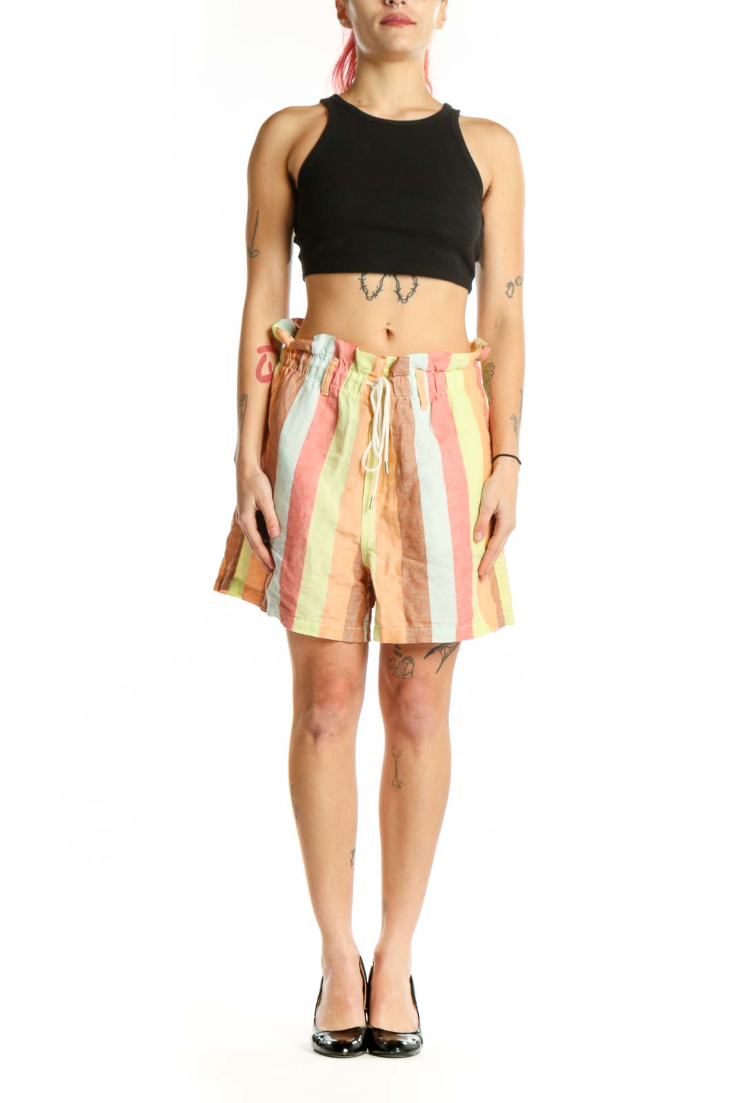 Front view of multicolor striped shorts with vertical pink, yellow, cream, and white stripes, featuring adjustable drawstring waist