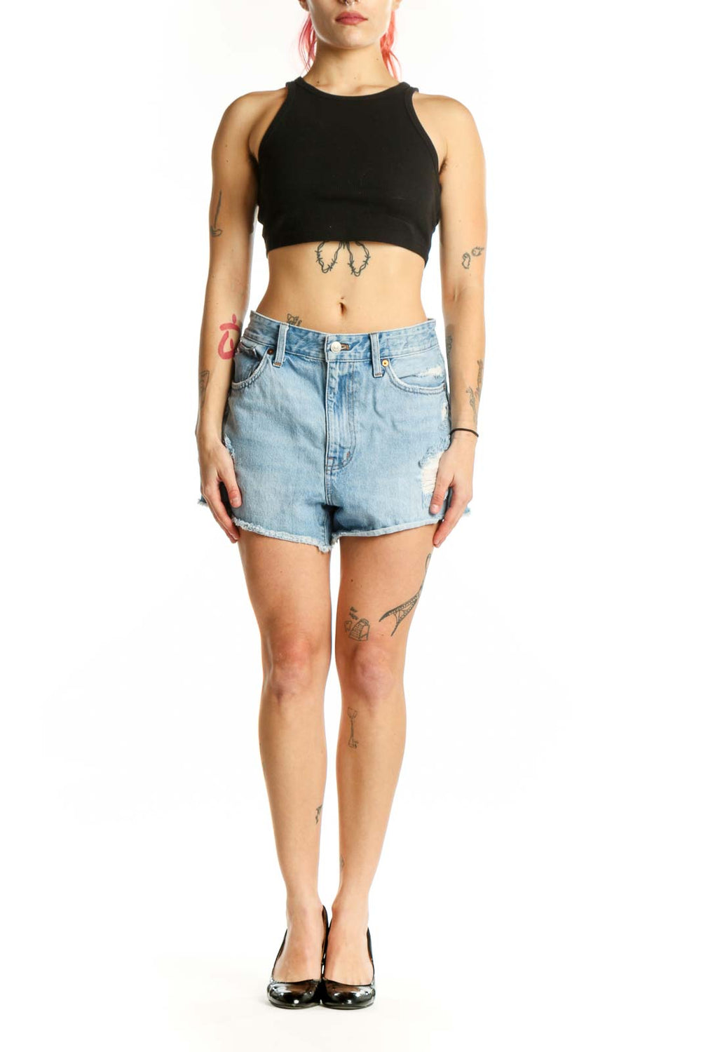 Light blue distressed denim shorts with raw-cut hem and five-pocket design, front view