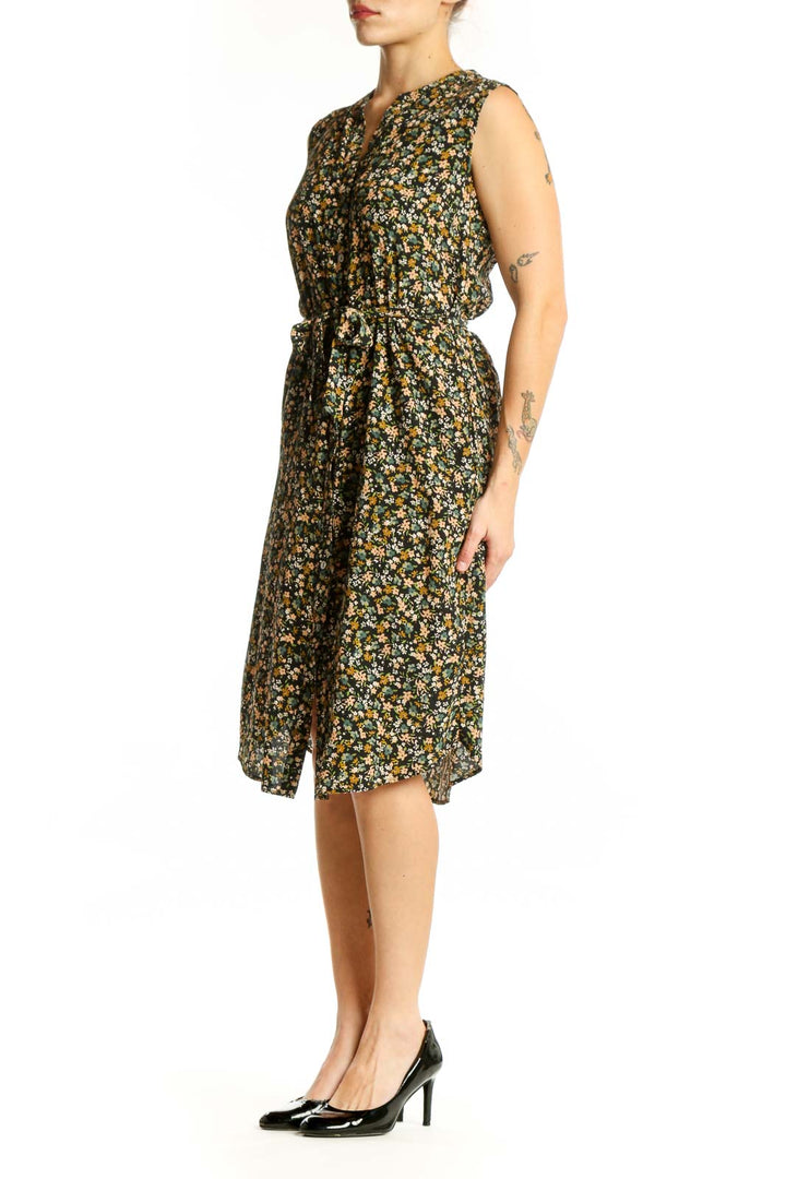 Black floral print sleeveless Amour Vert shirt dress with button-front and waist tie, front view