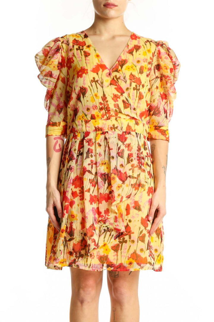 Red and yellow floral Walter Baker dress with puffed three-quarter sleeves and wrap V-neckline, front view