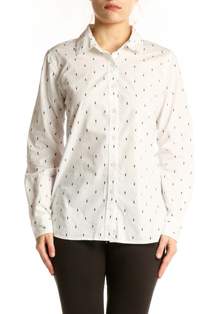 Cream Pima cotton button-up shirt with navy dash pattern, front view on model