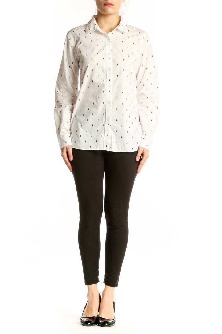 Cream Pima cotton button-up shirt with navy dash pattern, front view on model