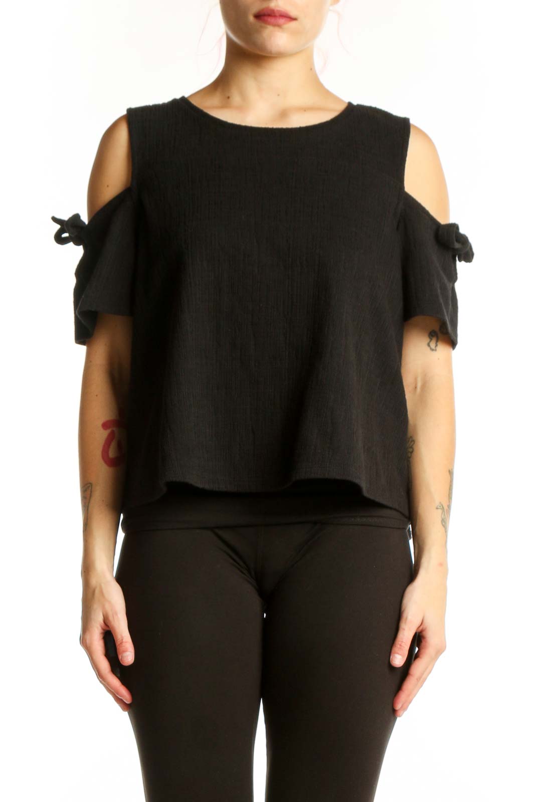 Black cold shoulder top with tie-detail sleeves by Madewell, front view on model