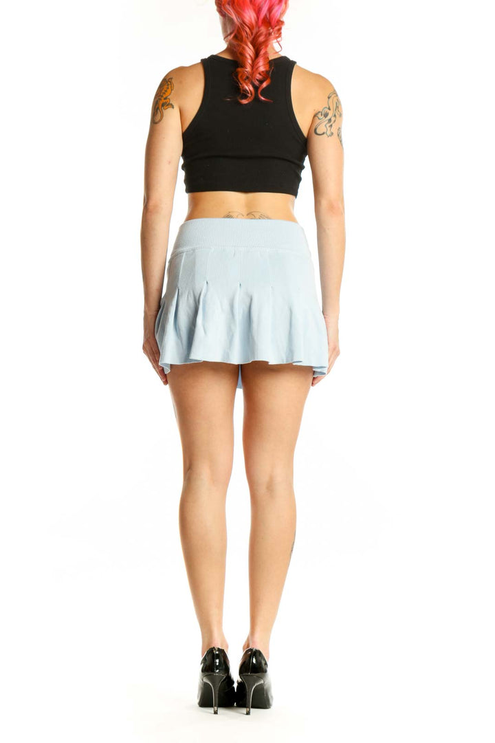 Light blue pleated mini skirt with A-line silhouette, back view showing pleated details