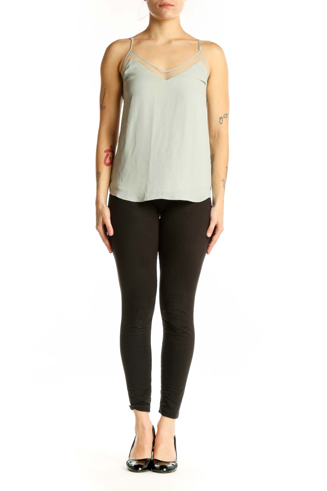 Cream camisole tank top with V-neckline and adjustable spaghetti straps, front view