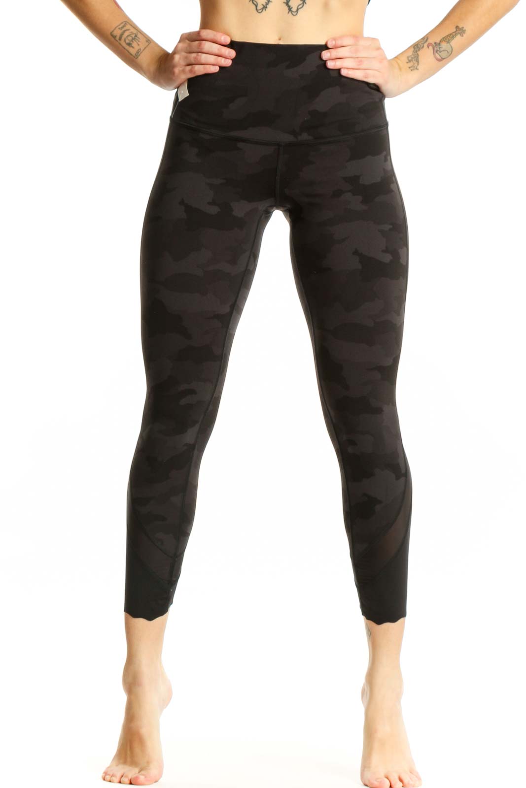 Black camouflage capri leggings with high-waisted design, front view