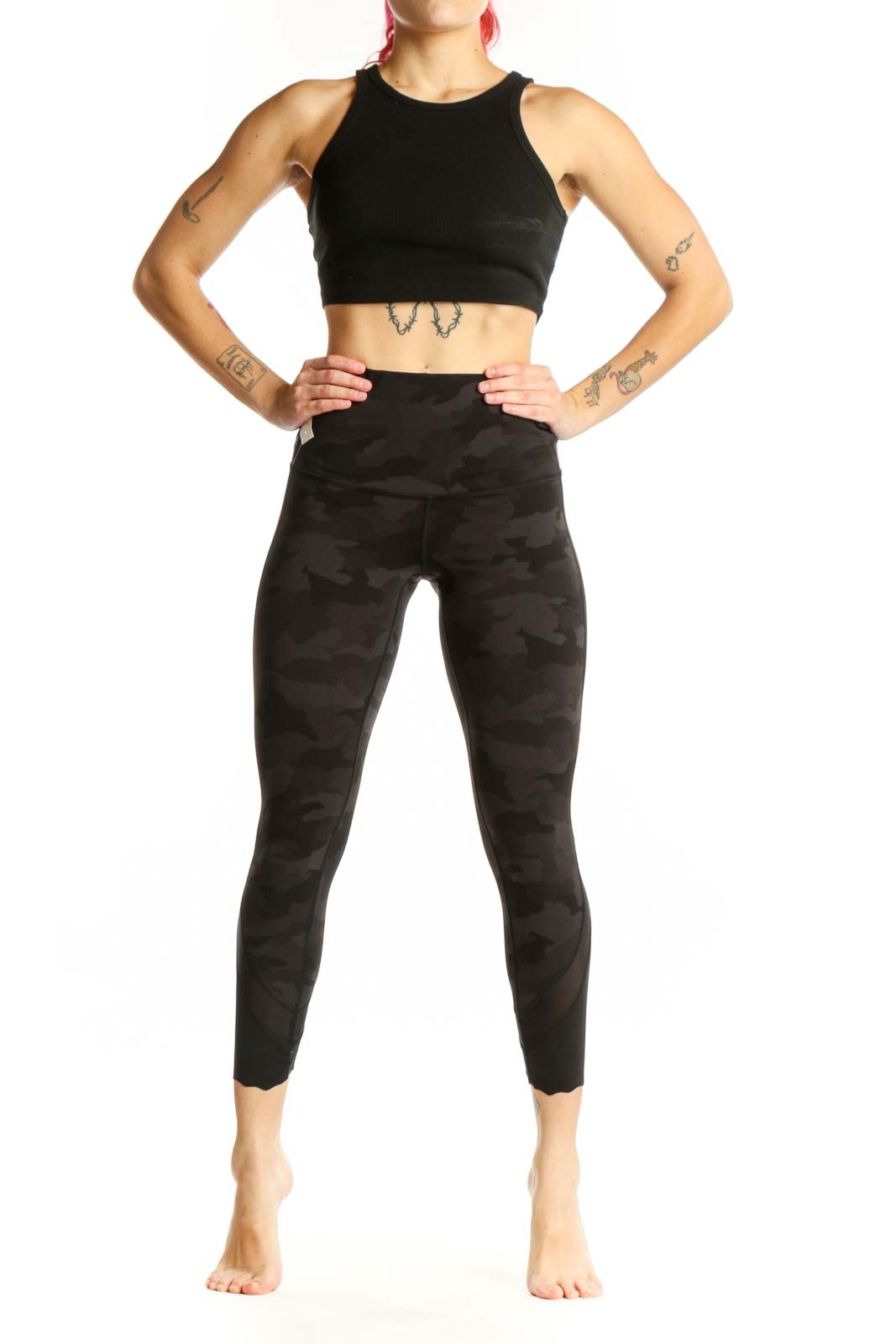 Black camouflage capri leggings with high-waisted design, front view