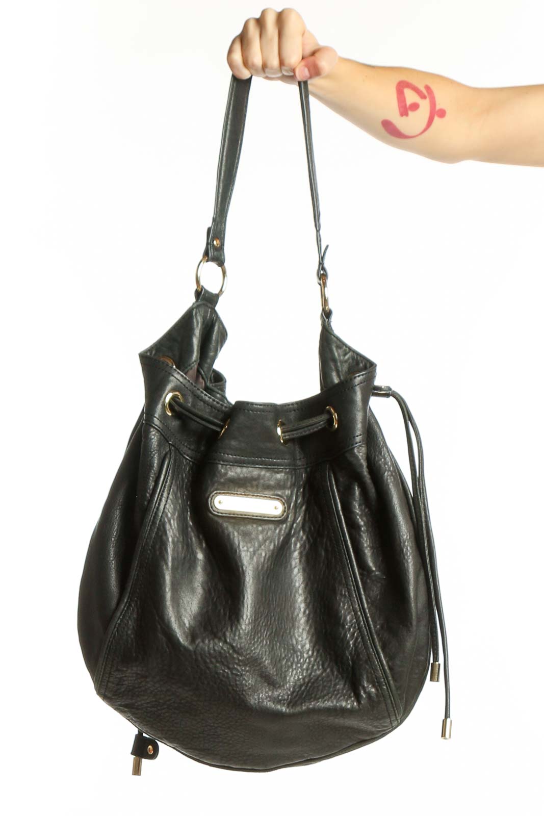 Black leather Juicy Couture hobo tote bag with dual shoulder straps and gold-tone hardware, front view