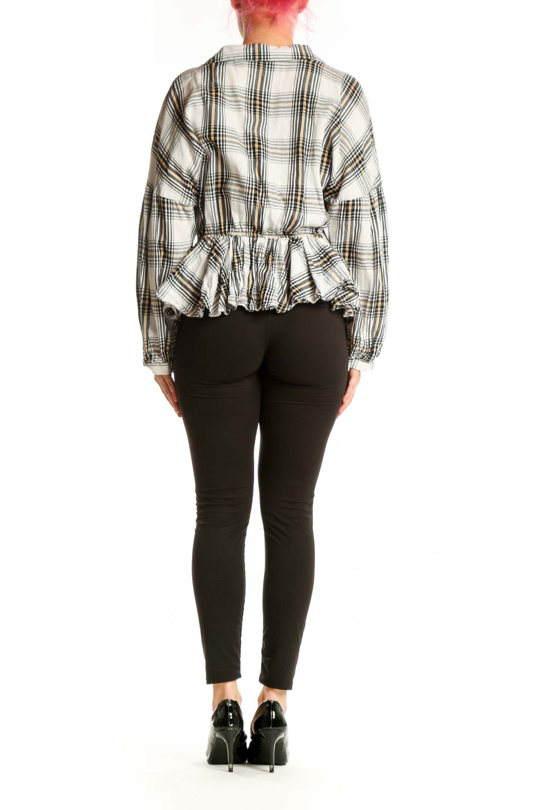 White and black plaid wrap top with peplum hem, back view showing gathered waistline