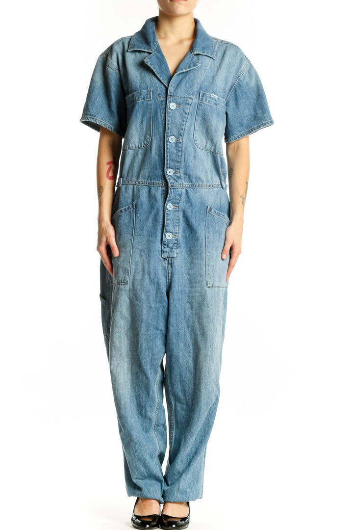 Pistola blue denim short sleeve jumpsuit with button-front closure and chest pockets, front view