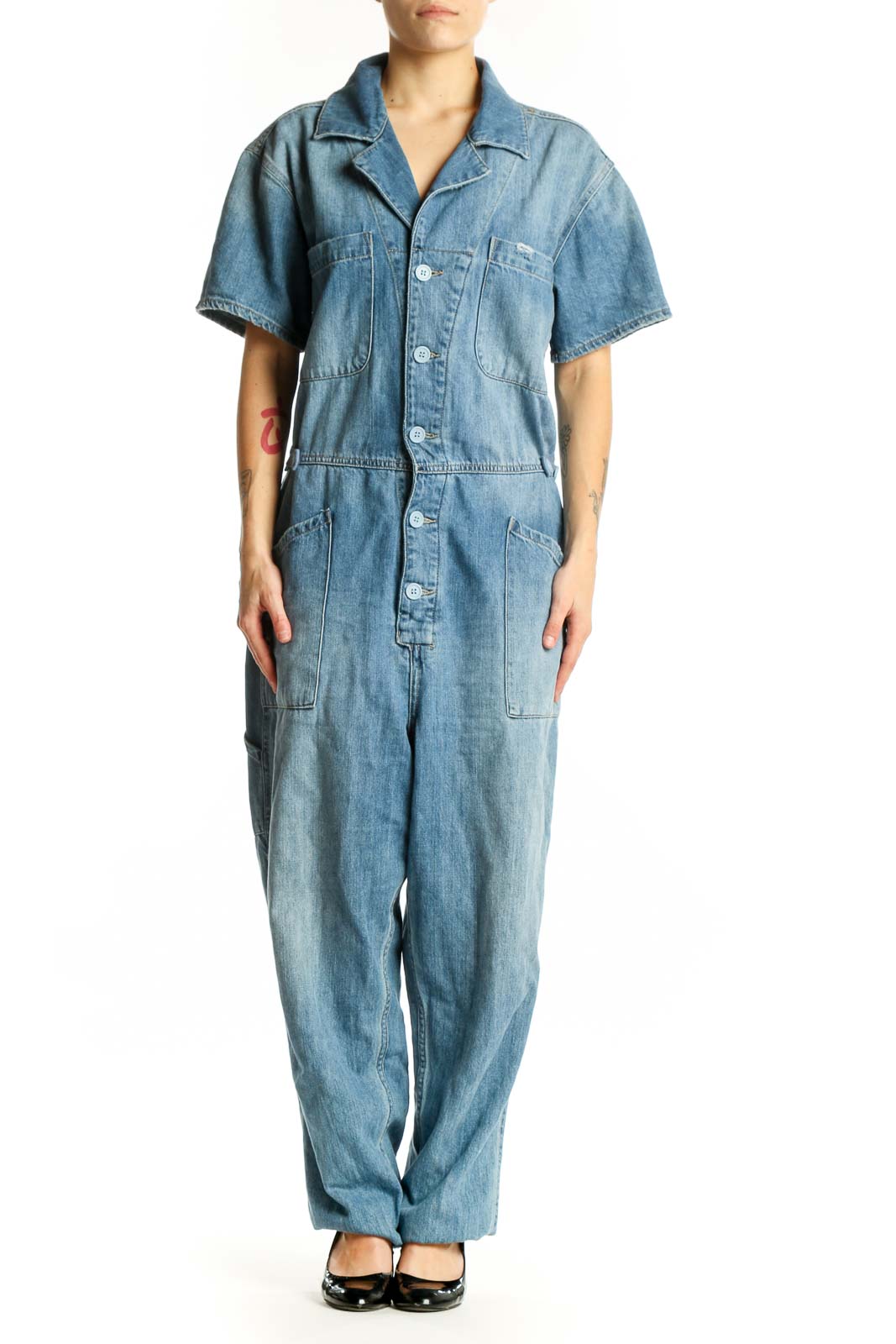 Pistola blue denim short sleeve jumpsuit with button-front closure and chest pockets, front view
