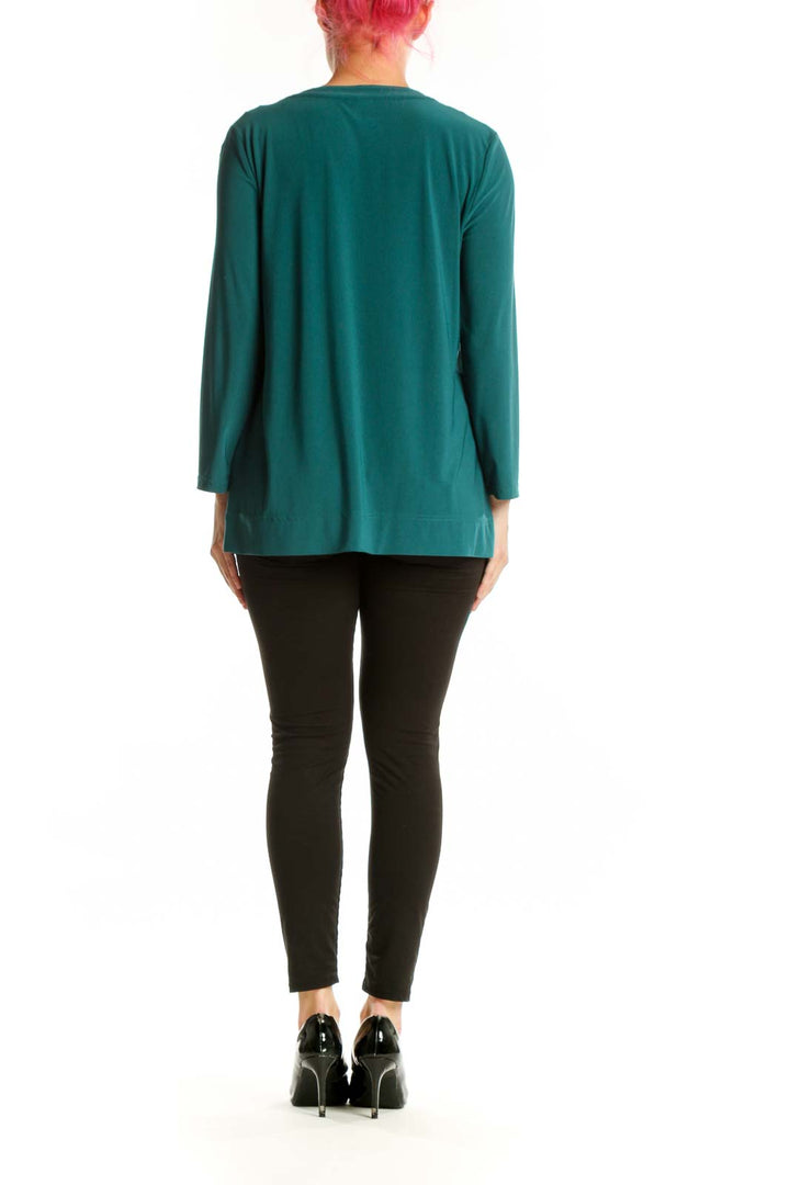 Anne Klein teal long sleeve henley top with chest pockets and gold hardware, back view