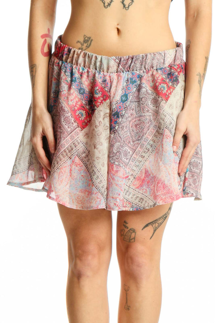Multicolor floral paisley shorts with elastic waistband and side ties, front view