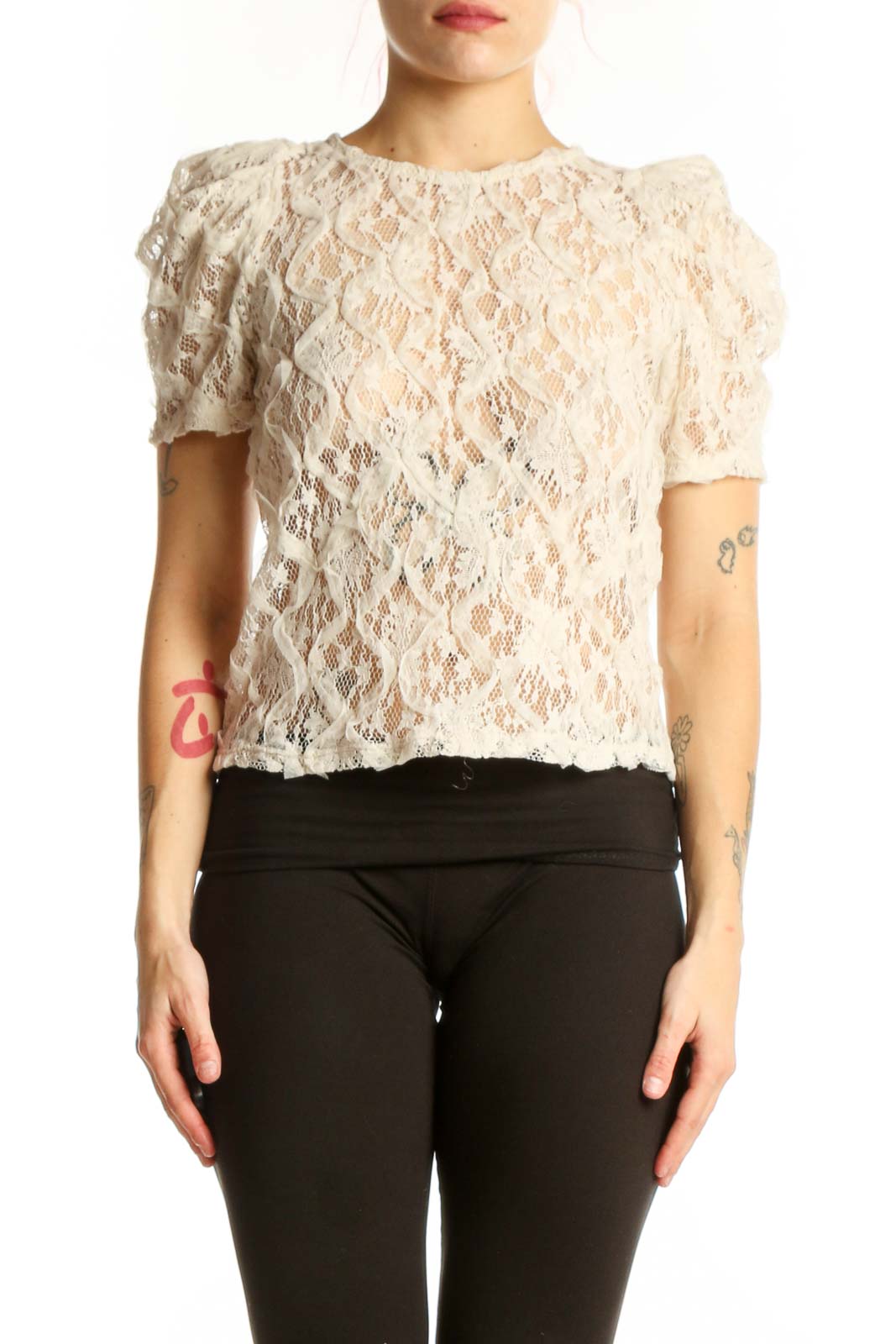 Cream lace puff sleeve top with all-over lace detailing and short puffed sleeves, front view