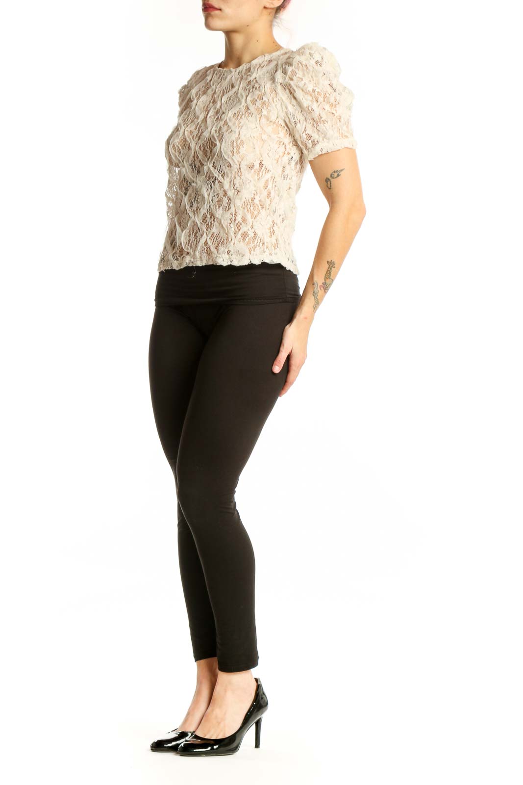 Cream lace puff sleeve top with all-over lace detailing and short puffed sleeves, front view