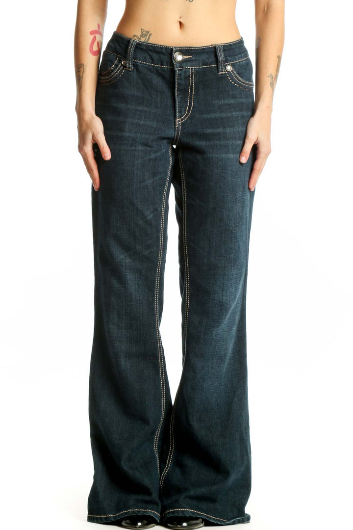 Front view of dark blue denim flare jeans with contrast stitching and mid-rise waist