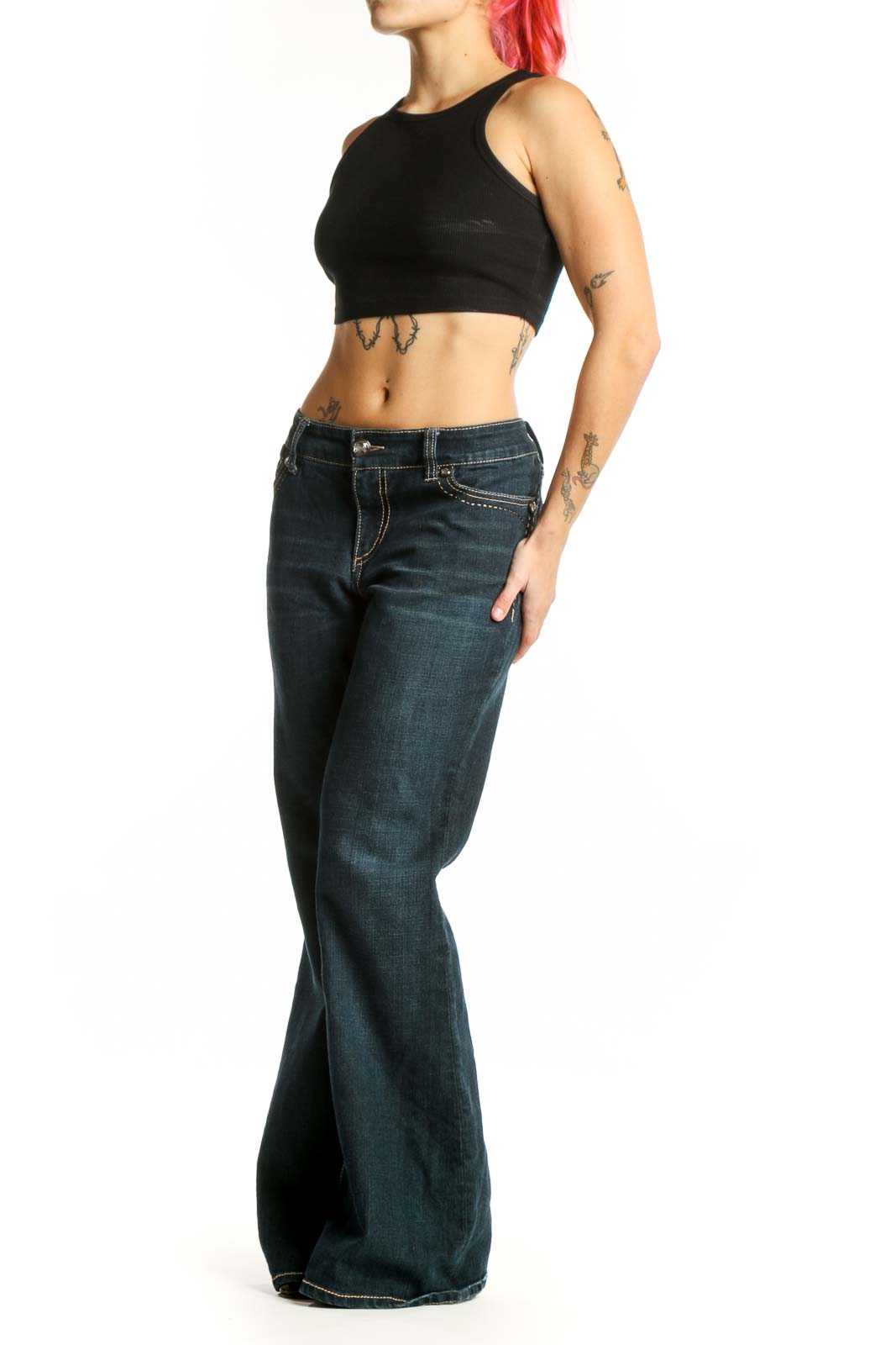 Front view of dark blue denim flare jeans with contrast stitching and mid-rise waist