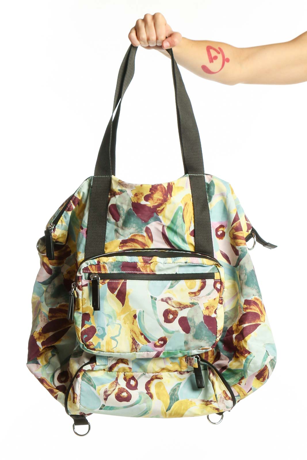 SilkRoll multicolor floral tote bag with botanical print, dark gray handles, and multiple zippered pockets displayed from front view