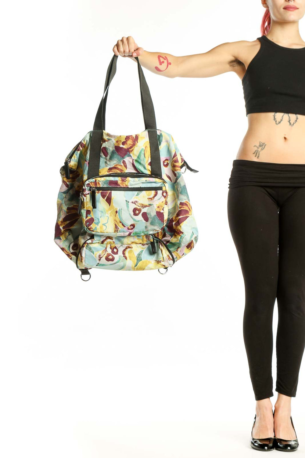 SilkRoll multicolor floral tote bag with botanical print, dark gray handles, and multiple zippered pockets displayed from front view
