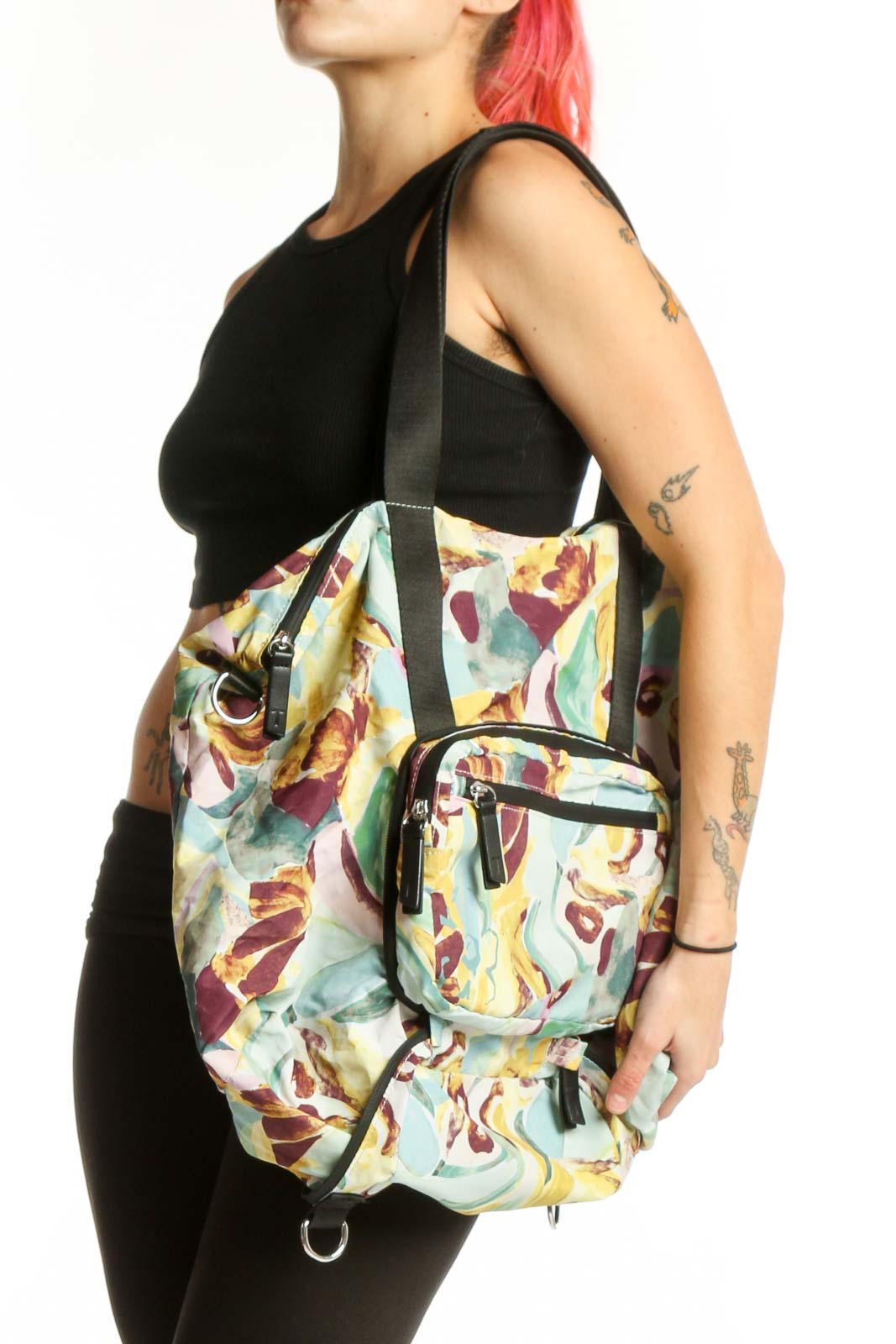 SilkRoll multicolor floral tote bag with botanical print, dark gray handles, and multiple zippered pockets displayed from front view