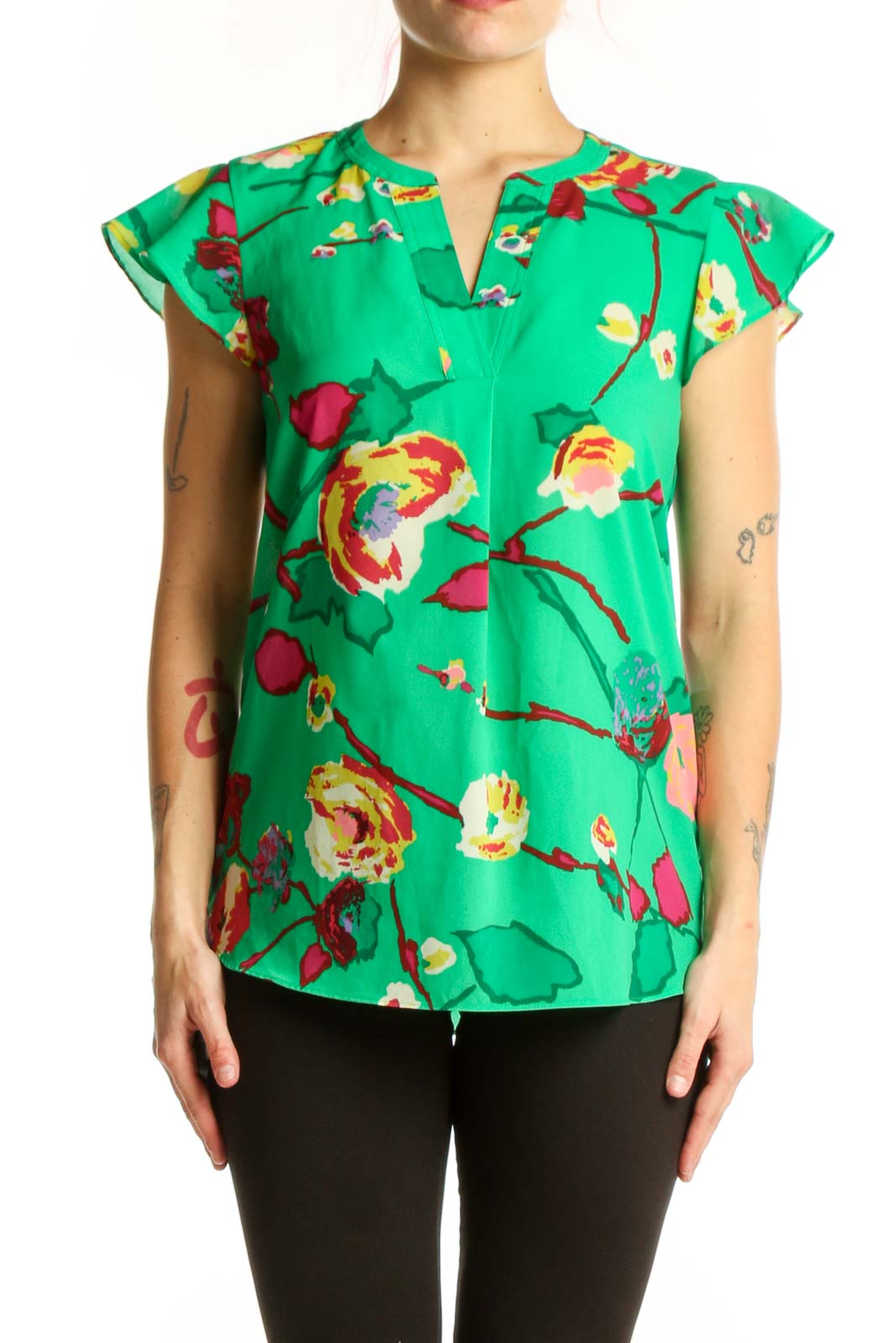 Green floral J.Crew top with red, yellow, and pink botanical print and ruffle cap sleeves, front view