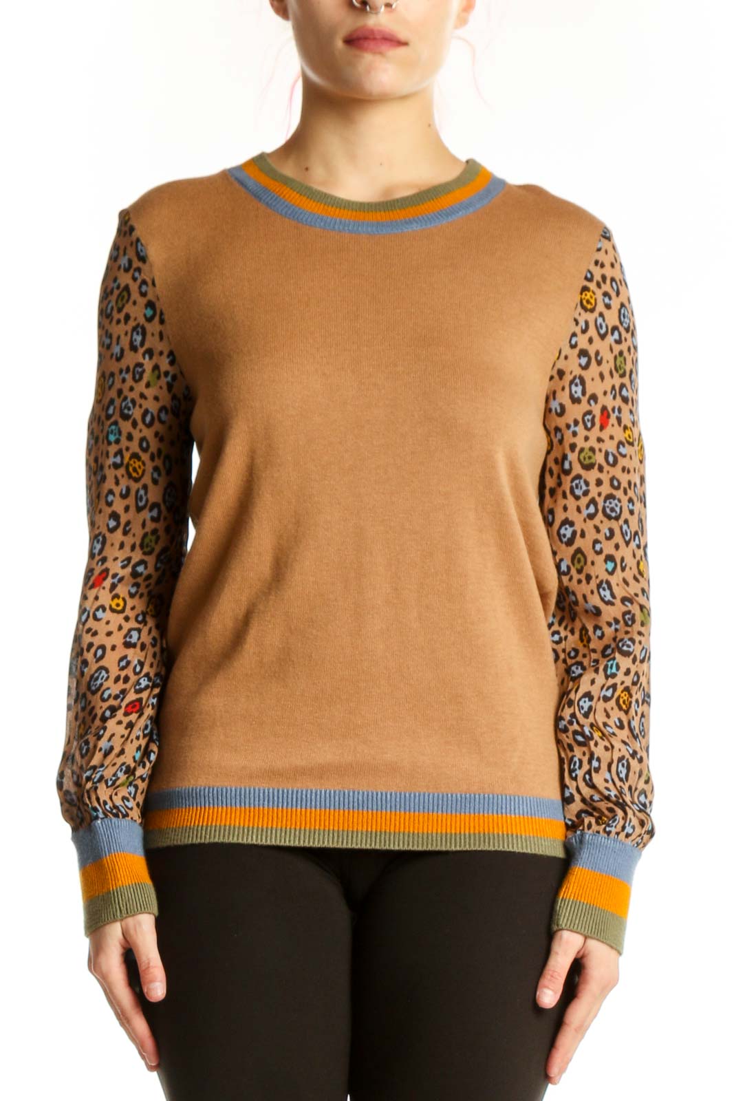 Camel and leopard print colorblock sweater with blue crew neck and orange striped ribbing, front view