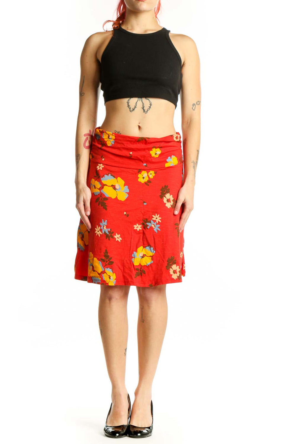 Red floral wrap skirt with multicolor flowers, adjustable tie waist, and A-line silhouette