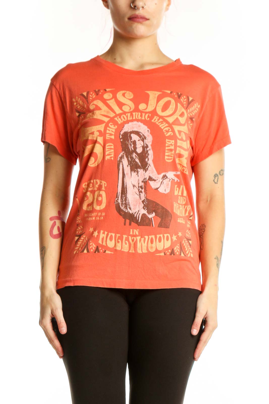 Orange graphic band t-shirt with vintage typography and distressed print design, front view