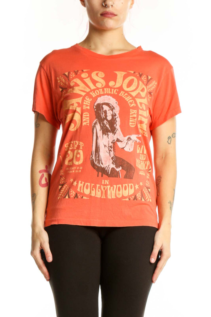 Orange graphic band t-shirt with vintage typography and distressed print design, front view