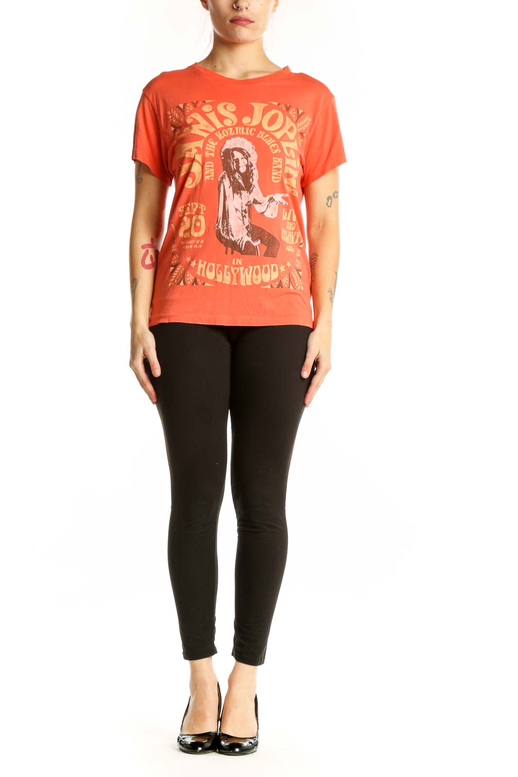 Orange graphic band t-shirt with vintage typography and distressed print design, front view
