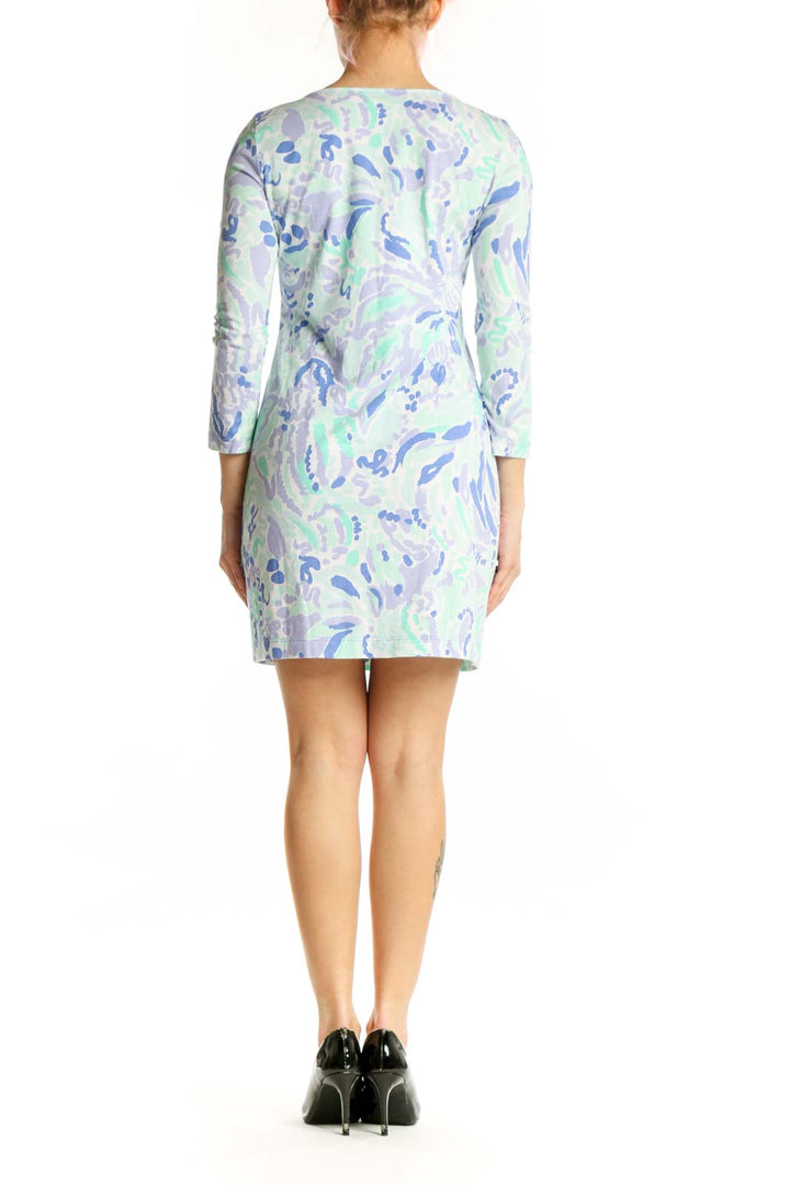 Blue floral Pima cotton shift dress with V-neckline and three-quarter sleeves, back view