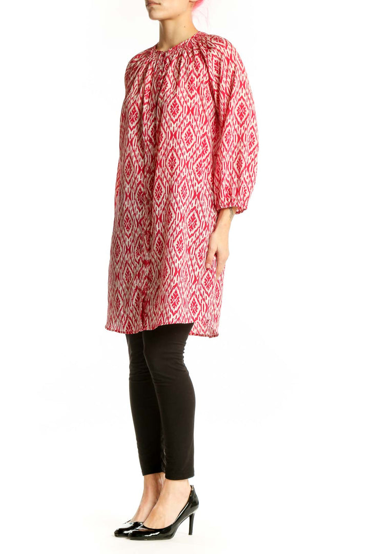 Red and white ikat print polyester tunic top by Maeve with three-quarter sleeves and crew neckline, front view