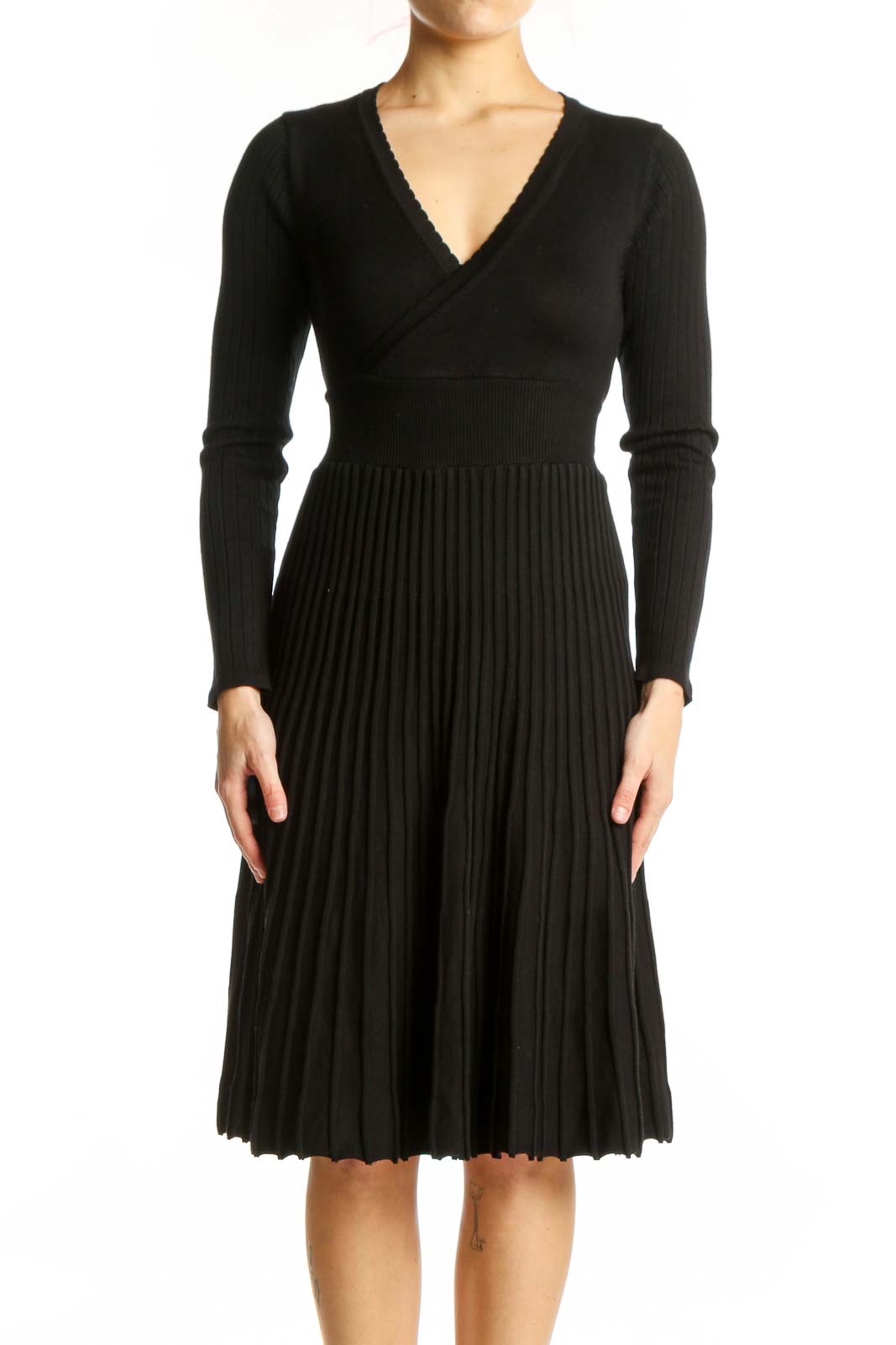 Black pleated wrap midi dress with V-neckline and long ribbed sleeves, front view