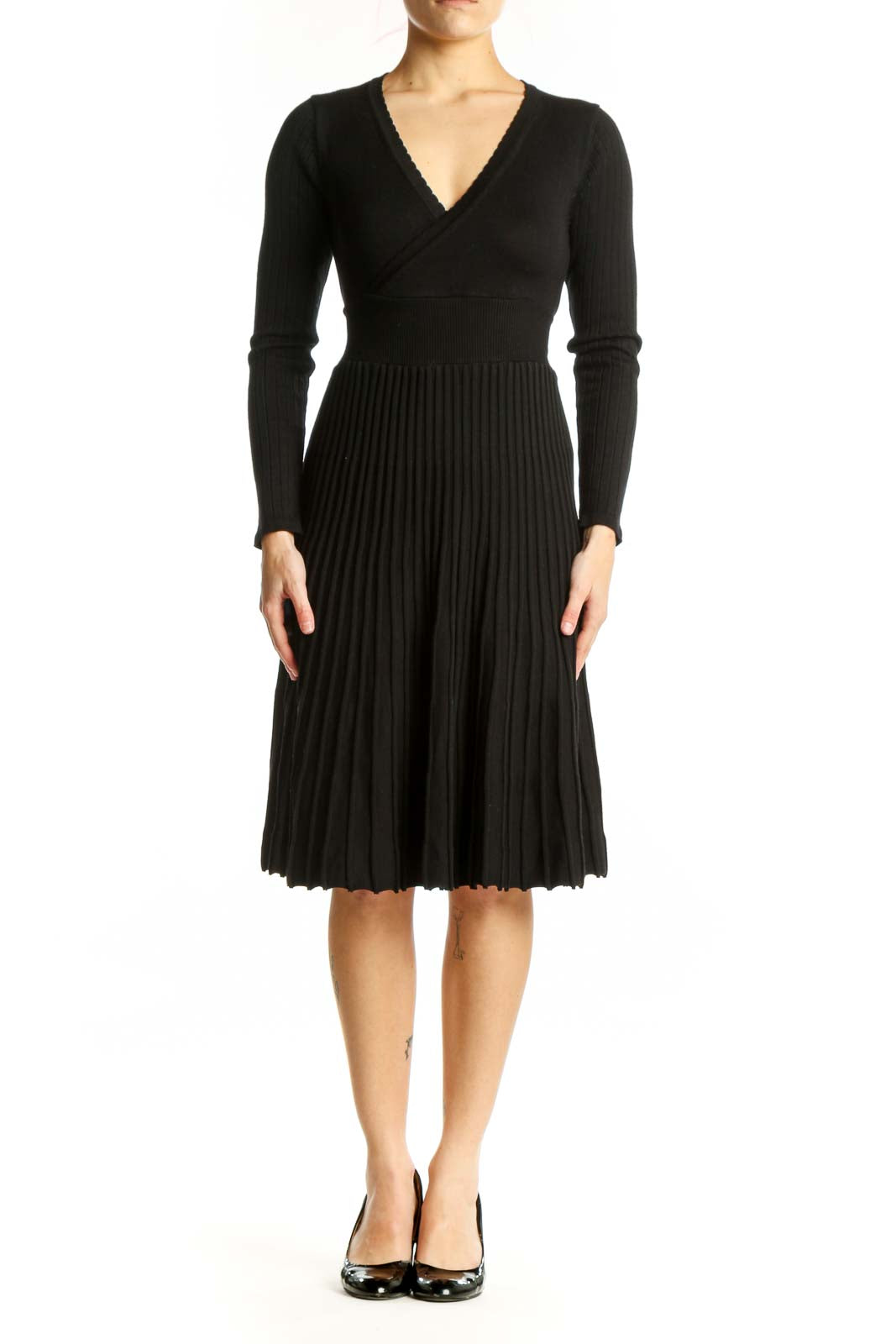 Black pleated wrap midi dress with V-neckline and long ribbed sleeves, front view