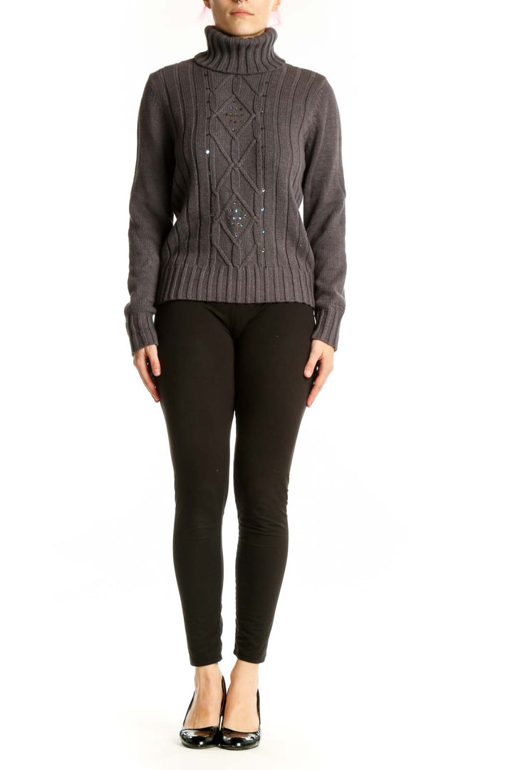 Gray cable knit turtleneck pullover with diamond pattern embellishments, front view