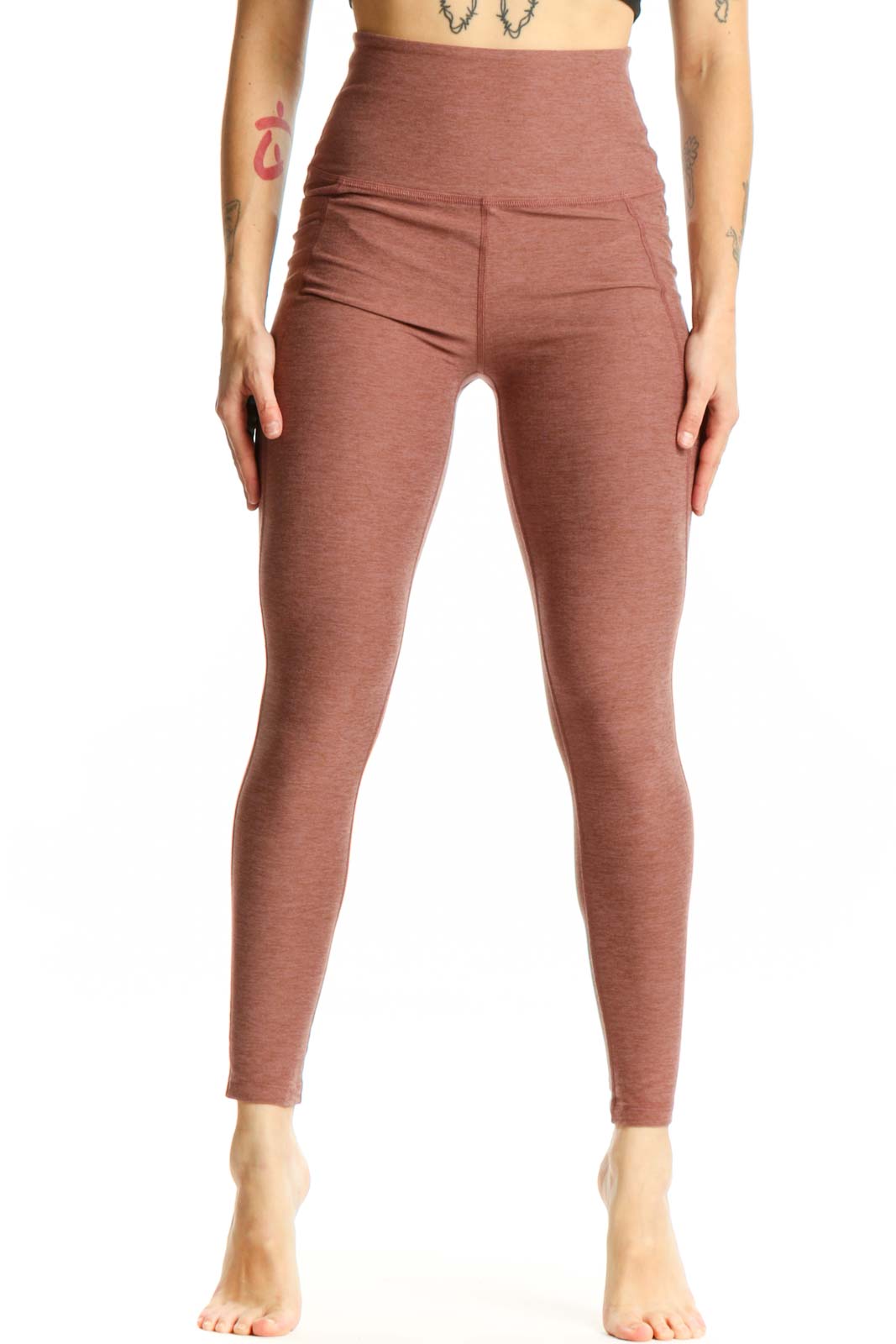 Beyond Yoga mauve high-waist cropped leggings front view showing fitted silhouette and textured fabric