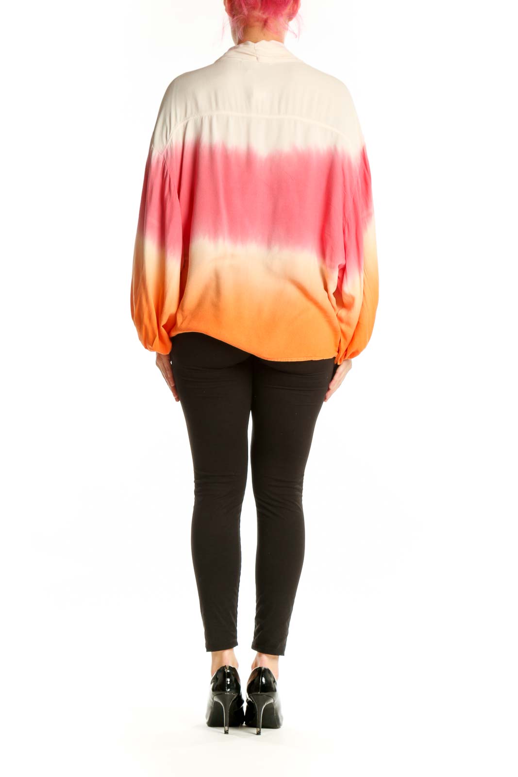 Back view of ombre gradient cardigan showing cream to pink to orange color transition with tie-front detail