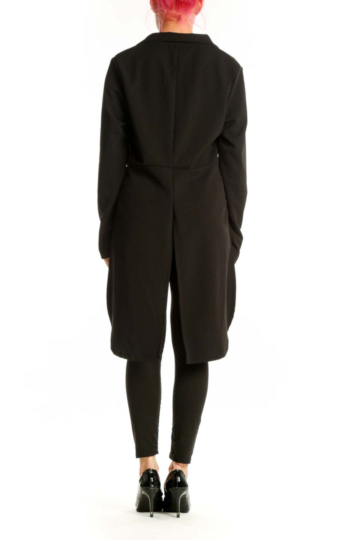 Back view of black cropped blazer jacket showing tailored fit and open-back design