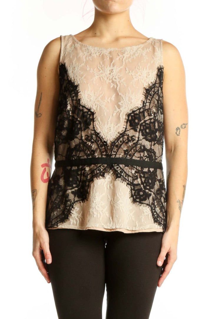 Cream and black lace sleeveless top by LOFT, front view showing intricate lace detailing and color-block design