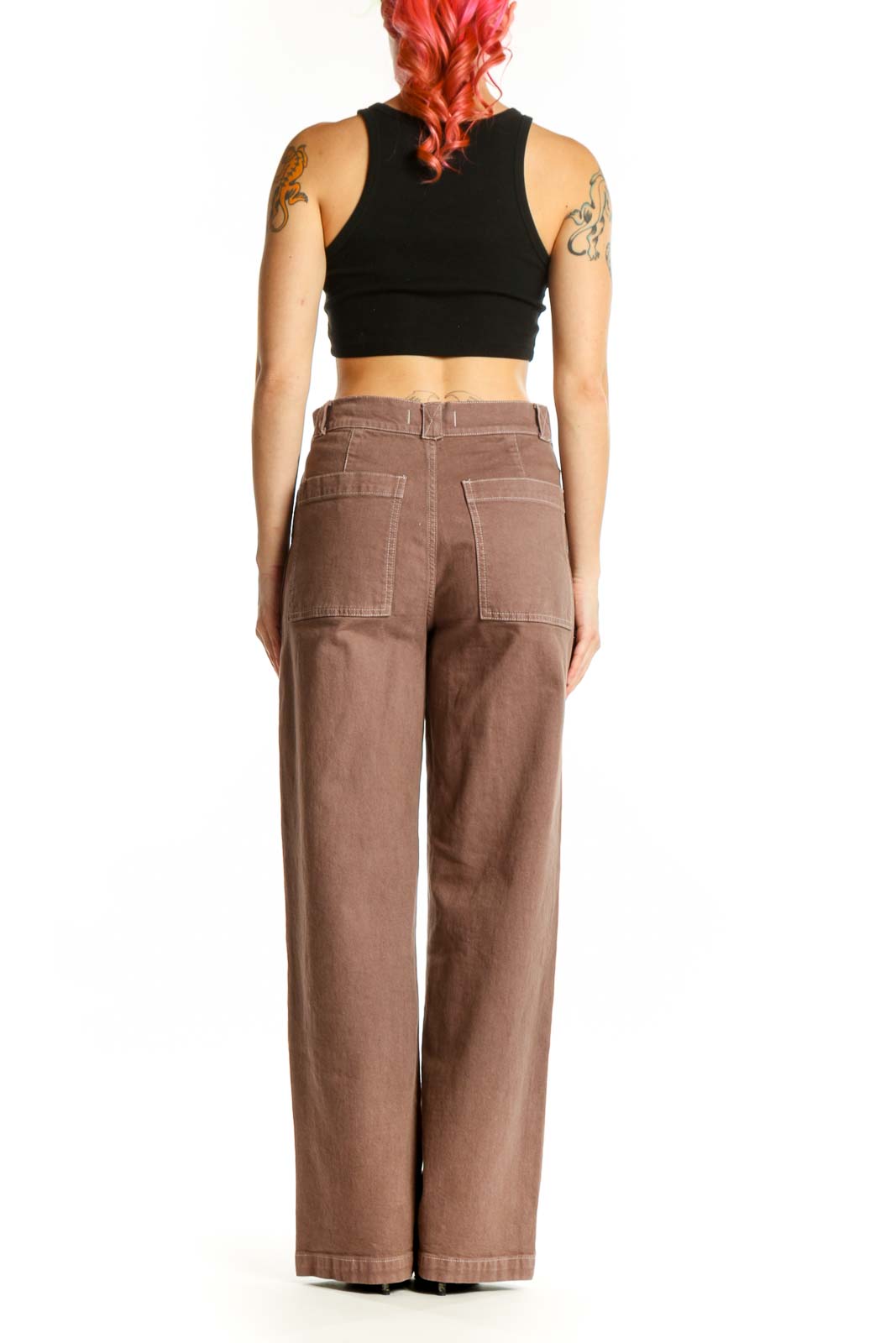 Back view of taupe wide-leg cotton denim pants by Madewell showing the rear pockets and straight-leg silhouette