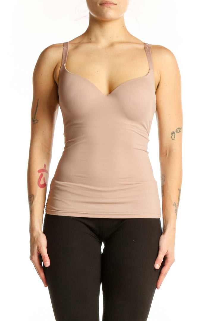 Beige fitted tank top with sweetheart neckline and ruched sides, front view