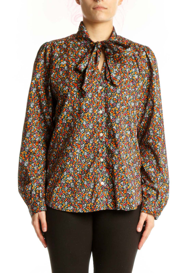 Multicolor floral print J.Crew blouse with tie-neck detail and puffed sleeves, front view