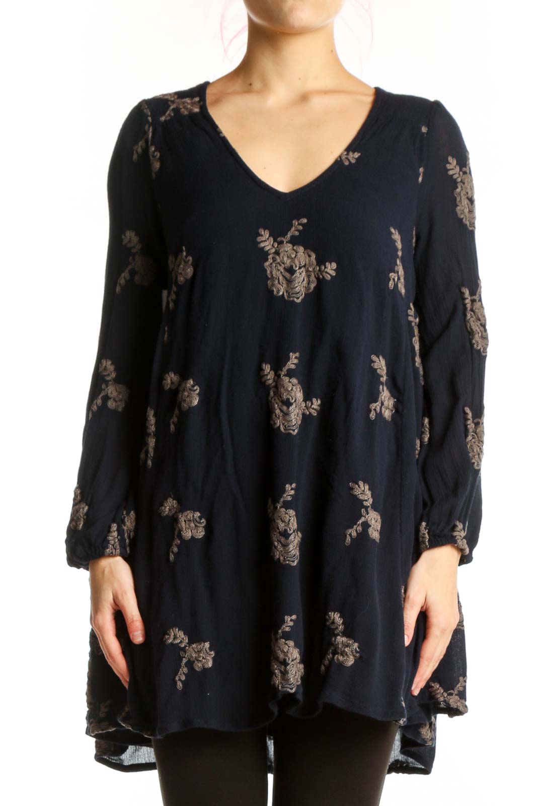 Navy floral print V-neck tunic top by Free People with long sleeves and A-line silhouette, front view