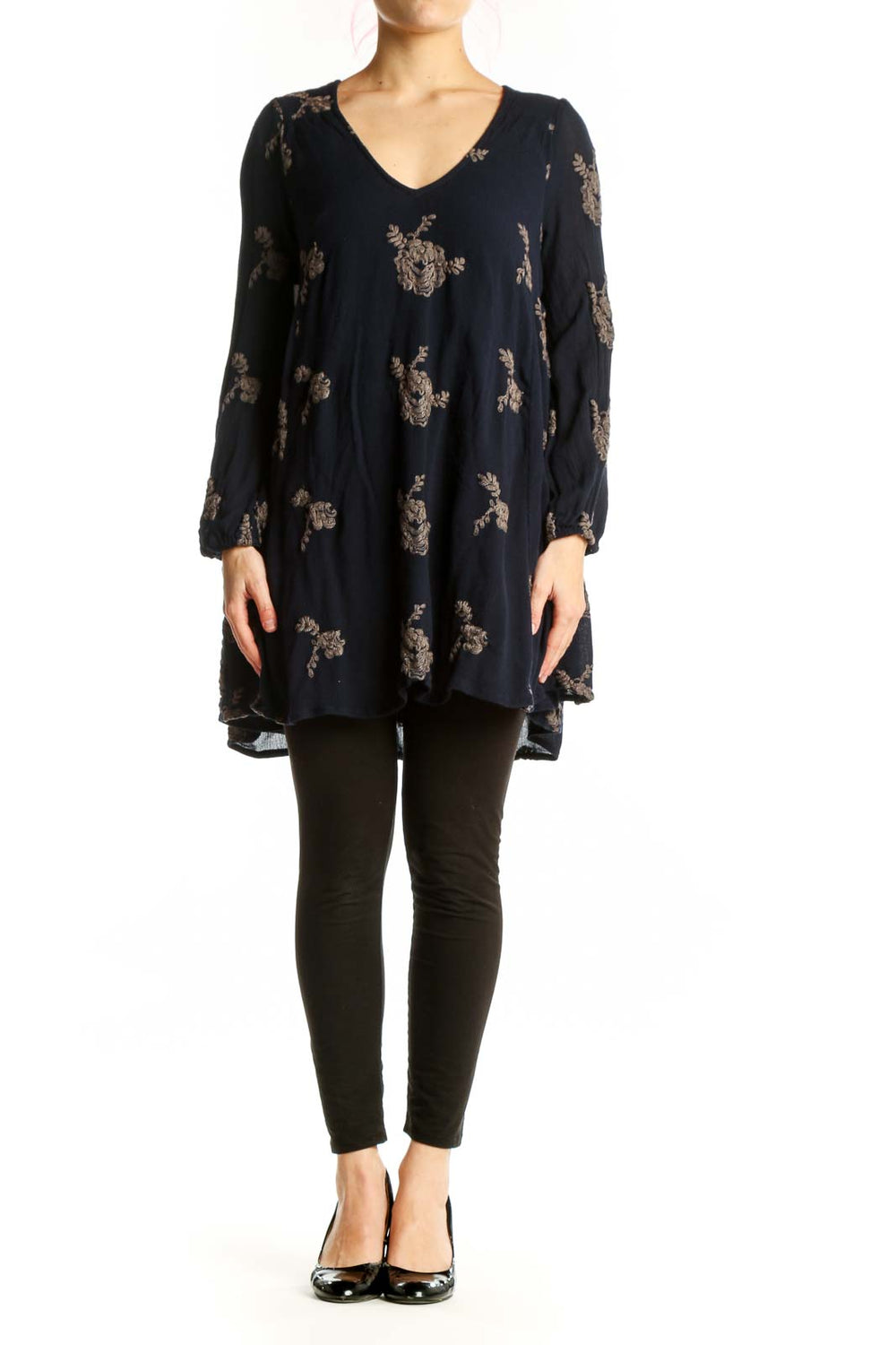 Navy floral print V-neck tunic top by Free People with long sleeves and A-line silhouette, front view