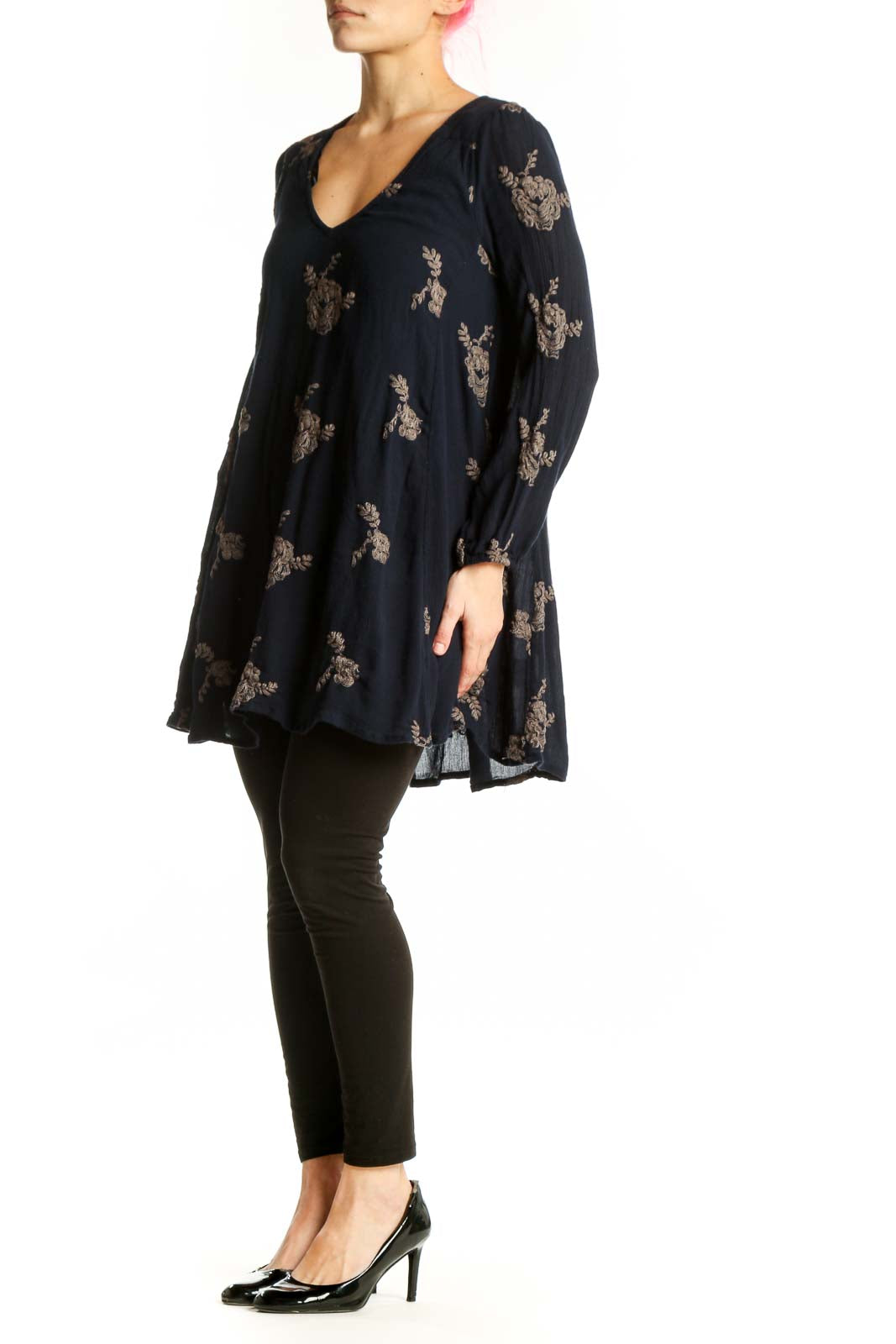 Navy floral print V-neck tunic top by Free People with long sleeves and A-line silhouette, front view