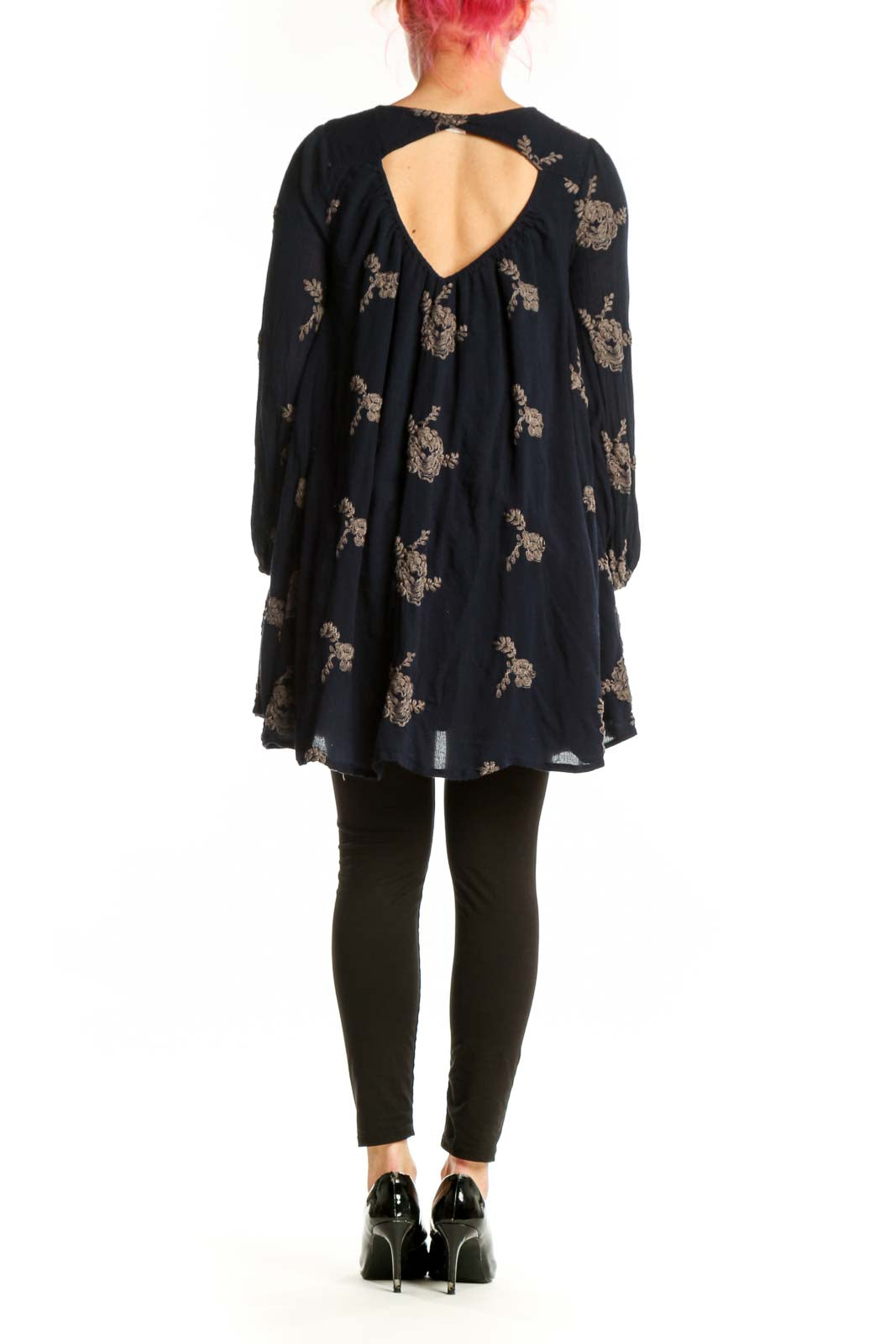 Navy floral print V-neck tunic top by Free People with long sleeves and A-line silhouette, back view
