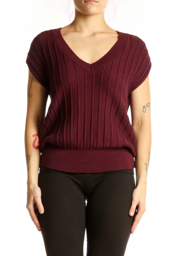 Burgundy ribbed v-neck knit top with cap sleeves, front view on model